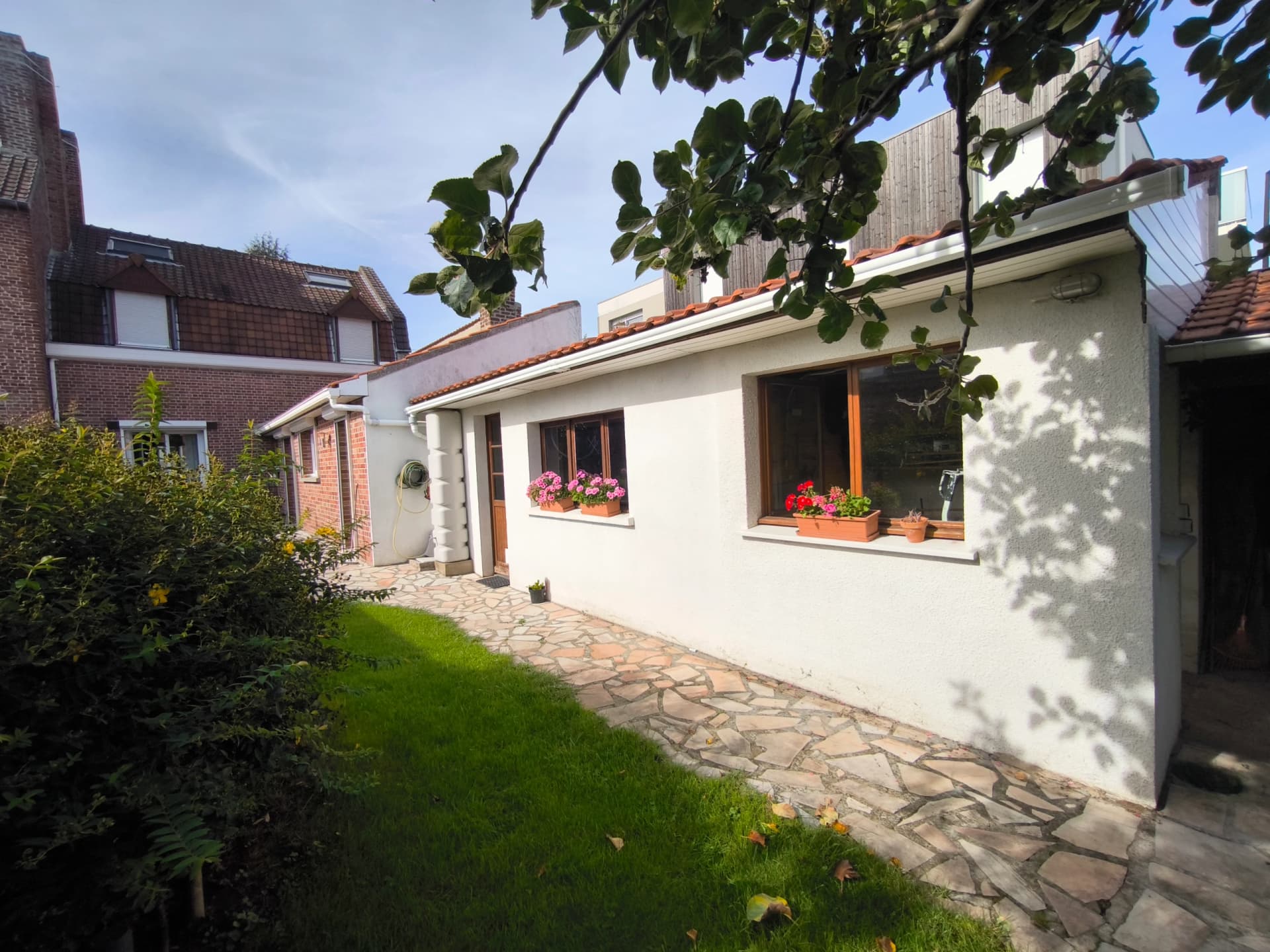 Maison de ville avec beau jardin !