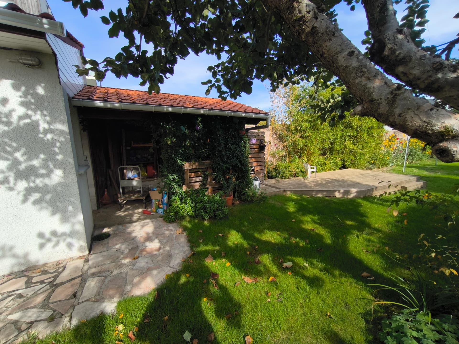 Maison de ville avec beau jardin !